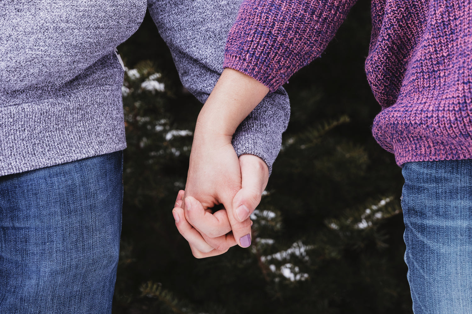 2 hands holding eachother